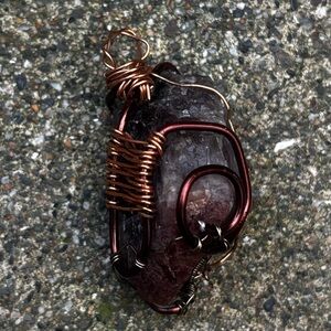 Handcrafted copper wire-wrapped raw gemstone pendant
